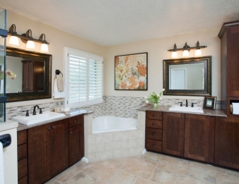 Master Bath with separate vanity areas and corner tub.